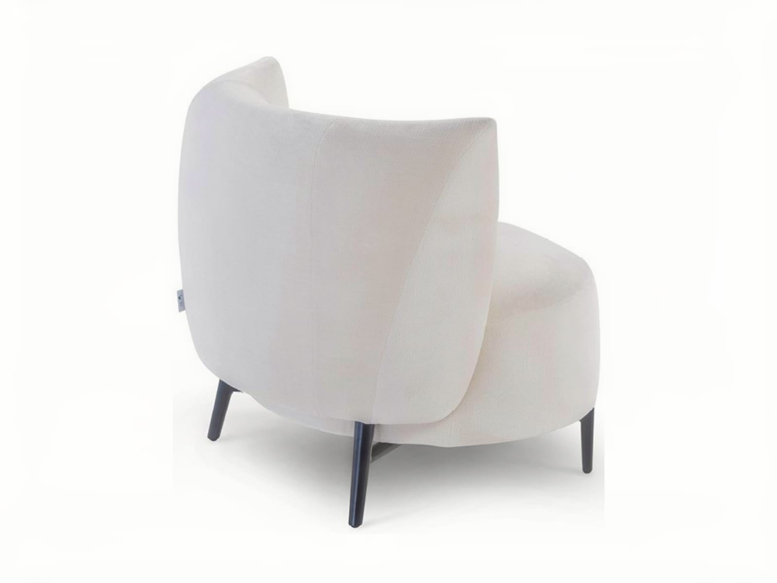 DRUSILLA The Drusilla easy chair combines 70's style with comfort, featuring an egg-shaped design and a cozy backrest for relaxed arm support.