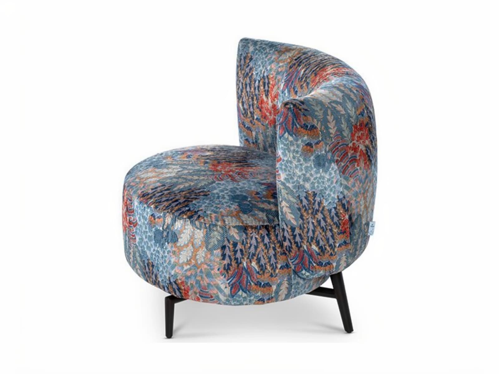 DRUSILLA The Drusilla easy chair combines 70's style with comfort, featuring an egg-shaped design and a cozy backrest for relaxed arm support.