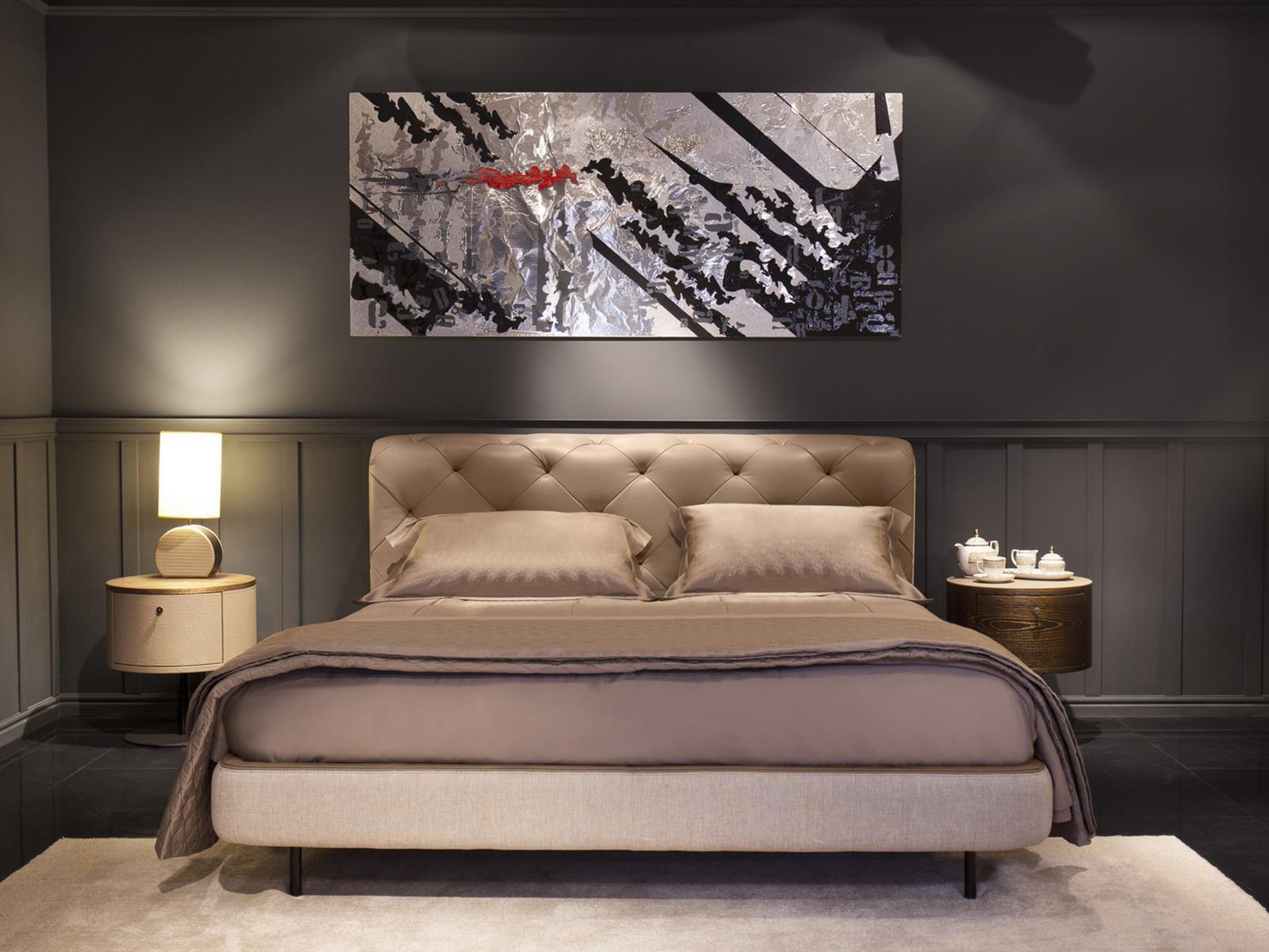 OVERSEAS Leather bed with tufted headboard