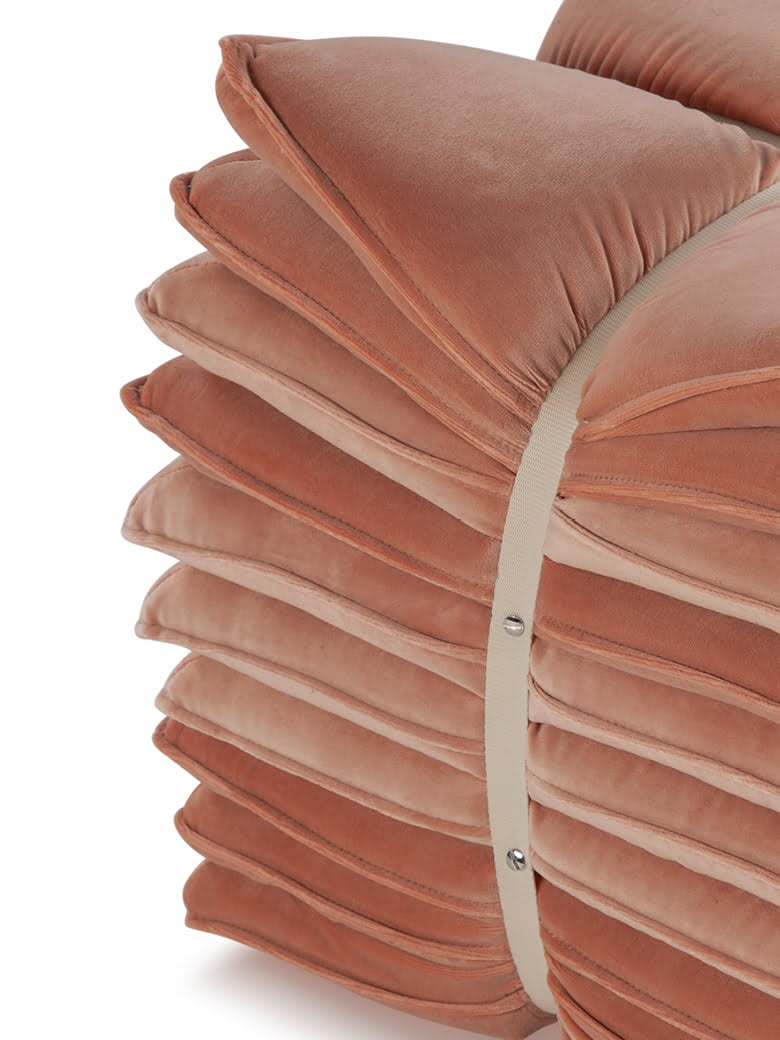 U’STROZZ Calia Italia's eco-sustainable U'Strozz footstools offer unique craftsmanship and adaptability, merging comfort with ecological awareness through upcycled materials.