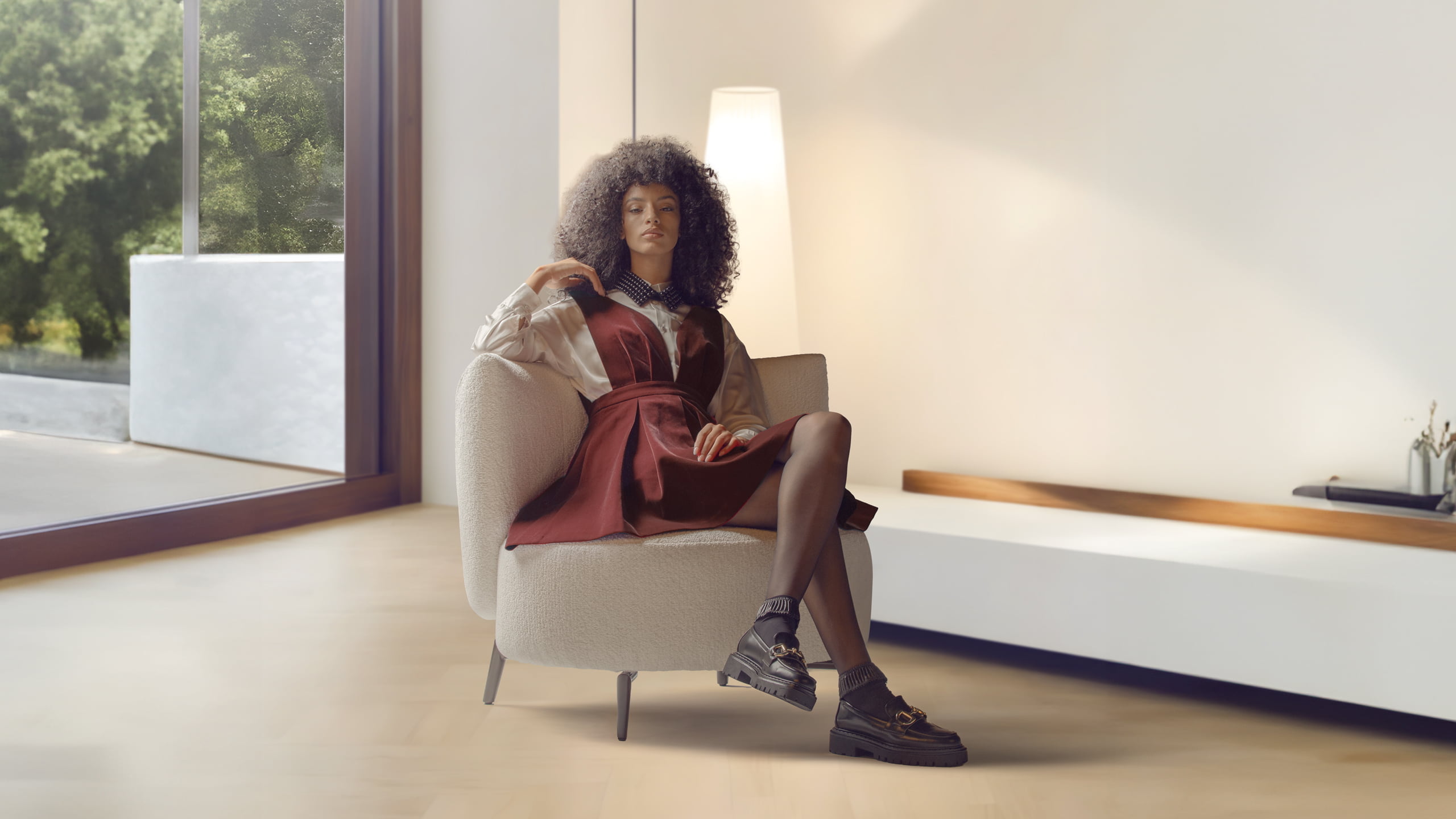 DRUSILLA The Drusilla easy chair combines 70's style with comfort, featuring an egg-shaped design and a cozy backrest for relaxed arm support.
