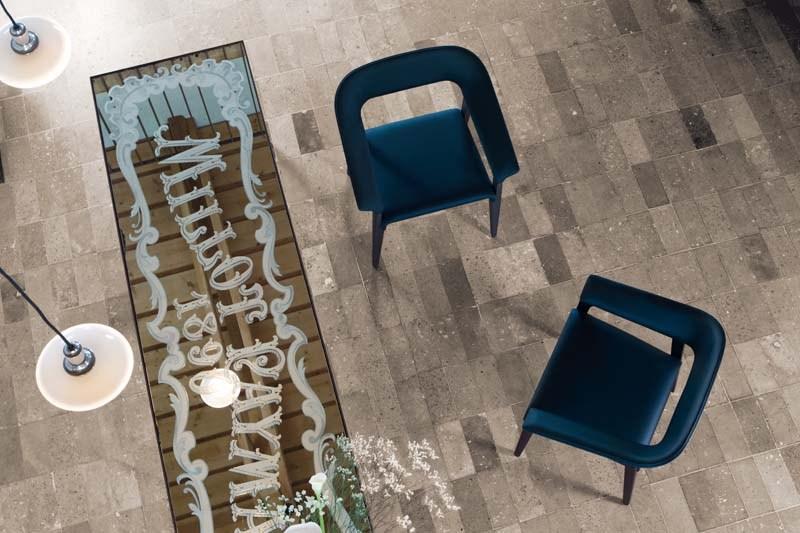 MEMORY Leather easy chair with armrests