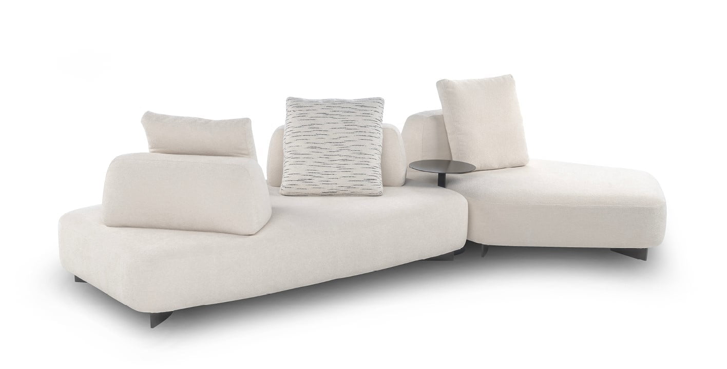 CREMINO Modular sofa with moveable backrests and versatile configurations, providing flexible comfort and Italian-inspired design aesthetics for innovative living spaces.
