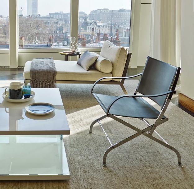 CARLOTTA Folding leather chair with armrests