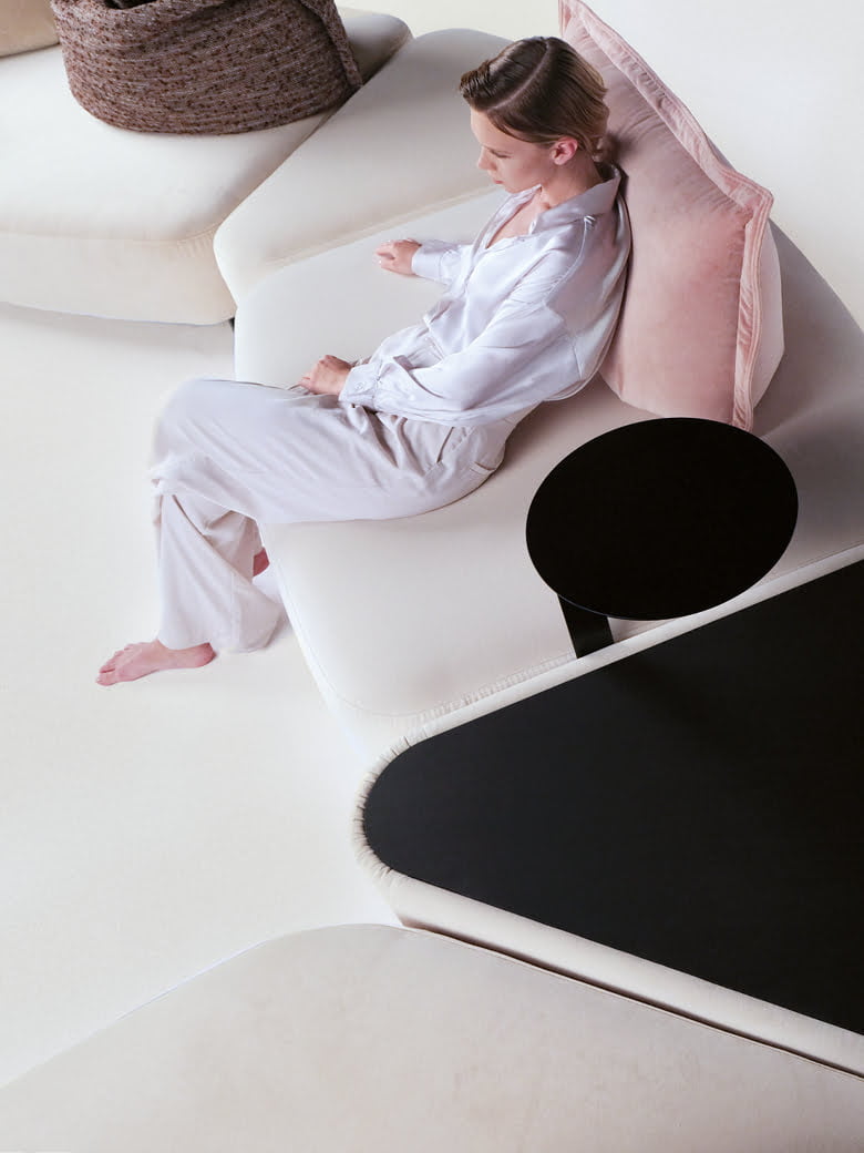 CREMINO Modular sofa with moveable backrests and versatile configurations, providing flexible comfort and Italian-inspired design aesthetics for innovative living spaces.