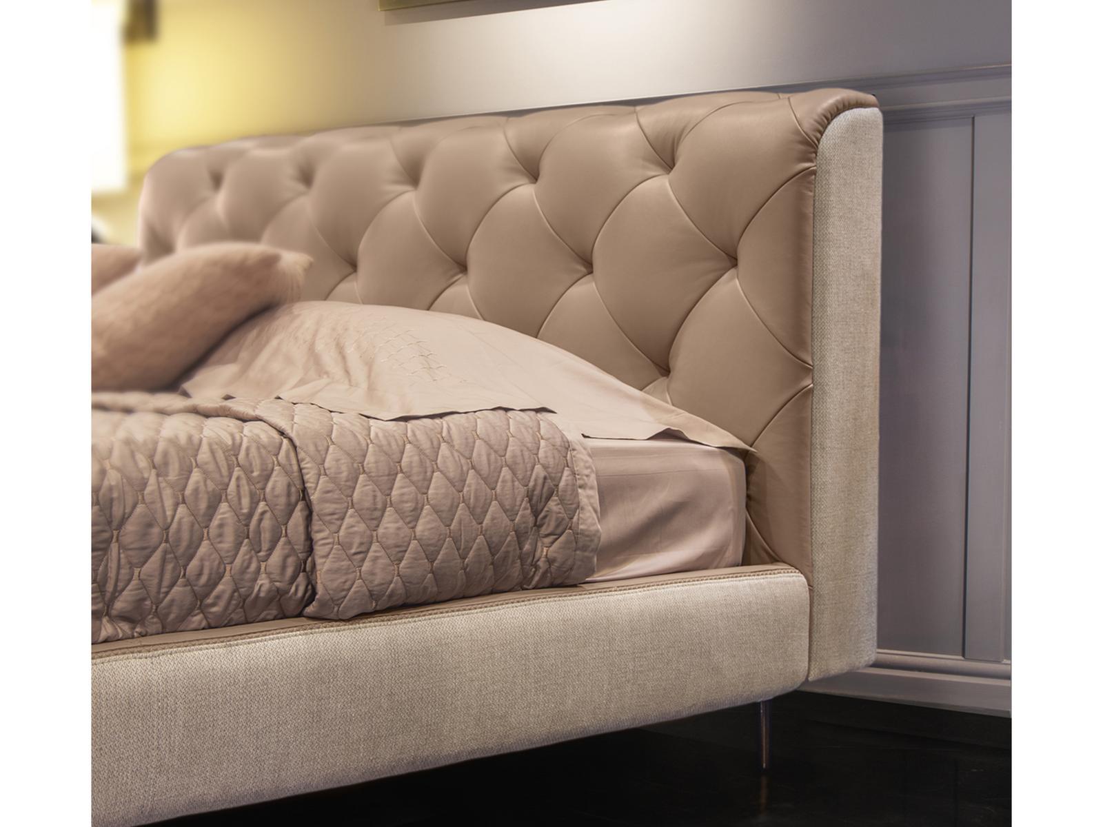 OVERSEAS Leather bed with tufted headboard