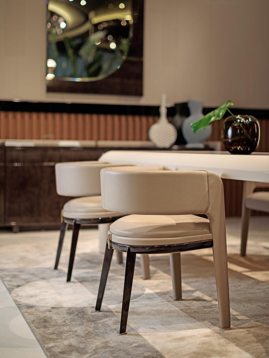 ECLIPSE Leather easy chair with armrests