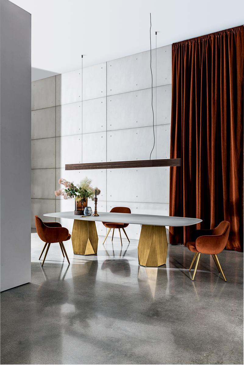 CADIRA Upholstered fabric chair with armrests