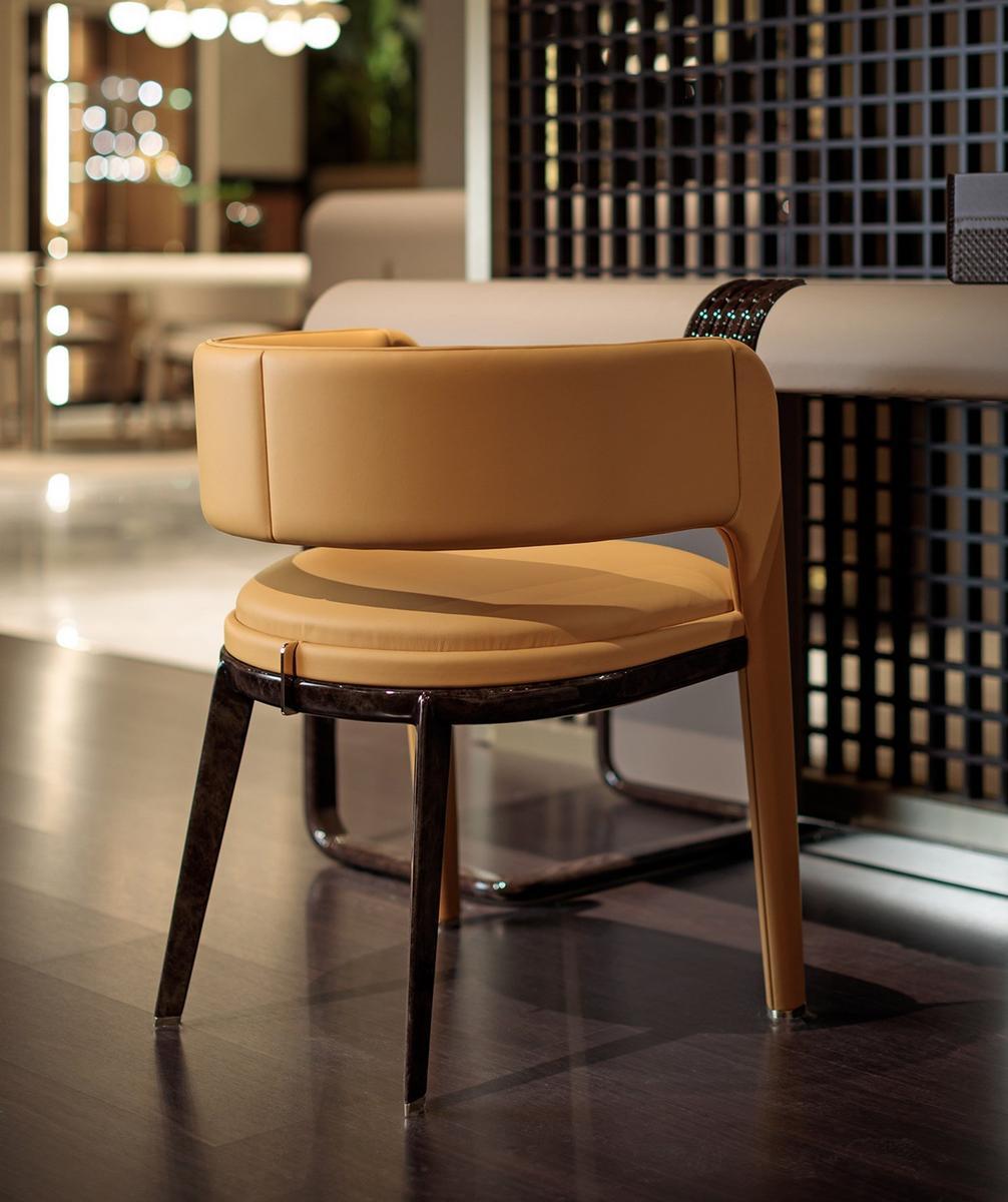 ECLIPSE Leather easy chair with armrests