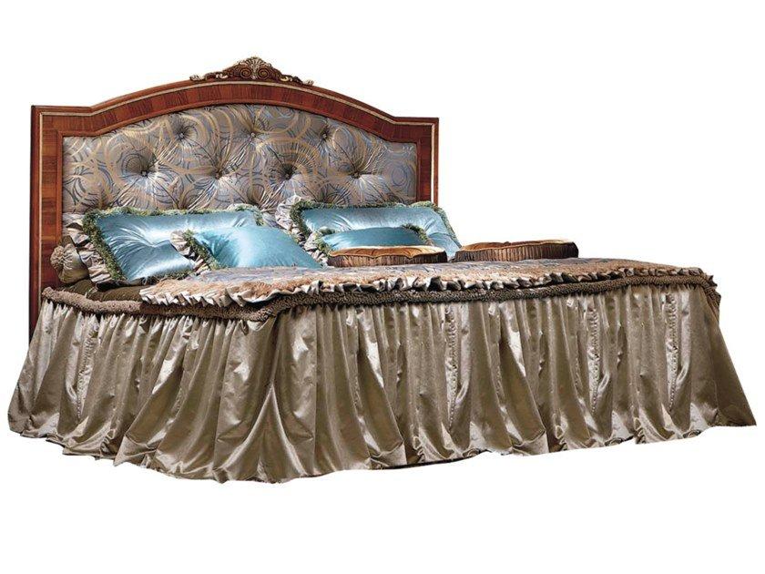 EMOZIONI Wooden double bed with upholstered headboard