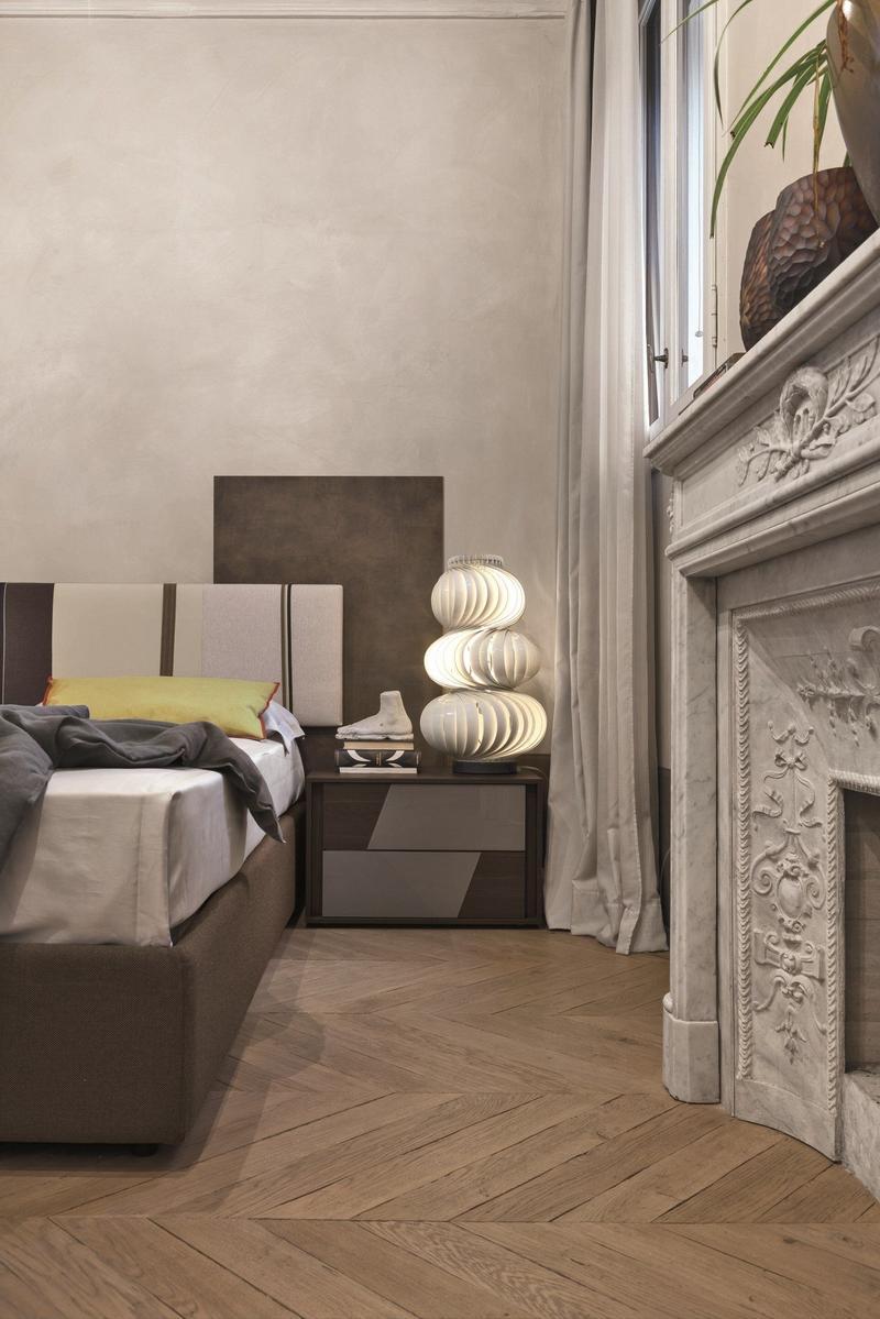 DIAGONAL Storage bed with upholstered headboard