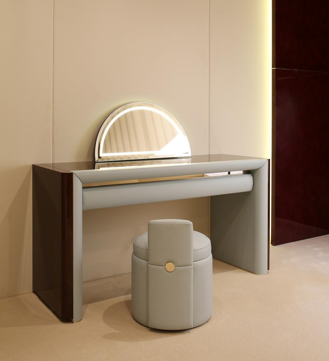 MADISON Upholstered round leather pouf