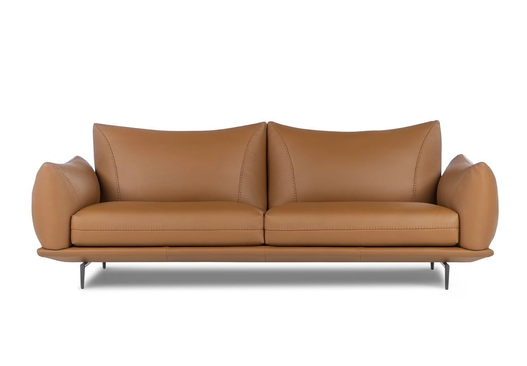 DRAGÉES Elegant sectional with heightened backrests for superior comfort, minimal base, and decorative stitching, combining sophistication with supported relaxation.