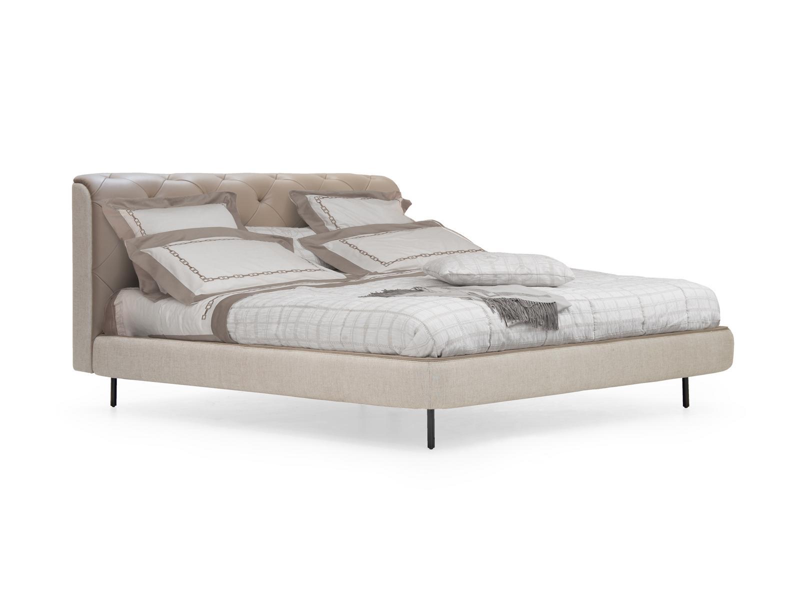 OVERSEAS Leather bed with tufted headboard