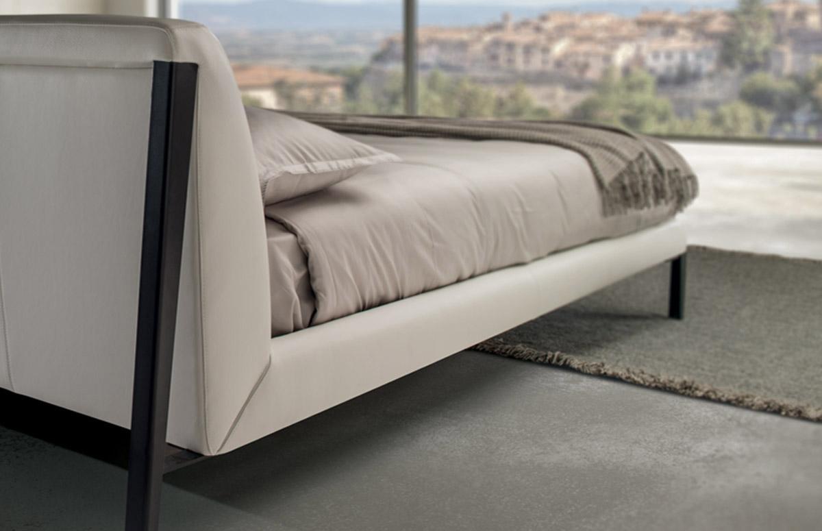 DIAMANTE Leather double bed with upholstered headboard