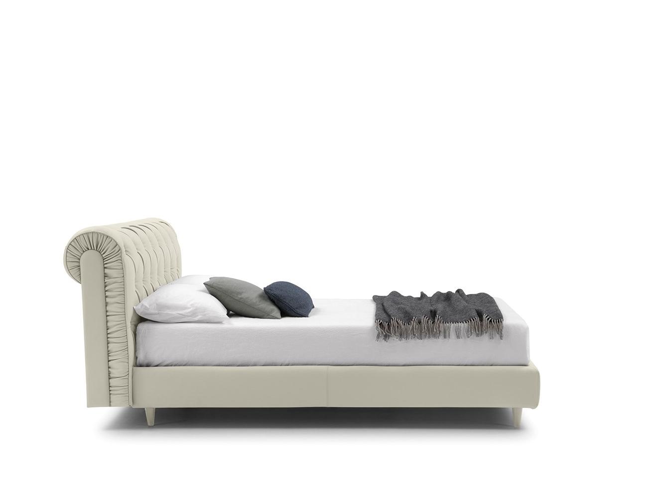 EXIGE Double bed with tufted headboard