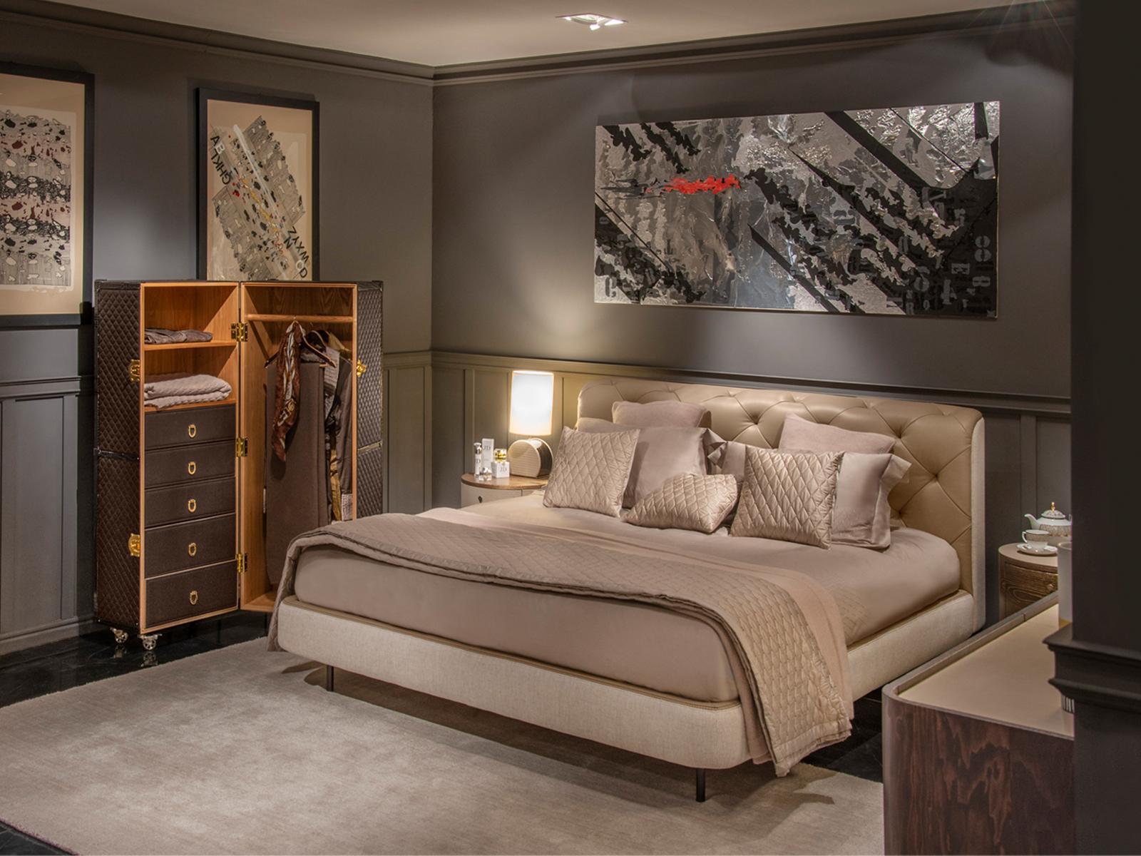 OVERSEAS Leather bed with tufted headboard