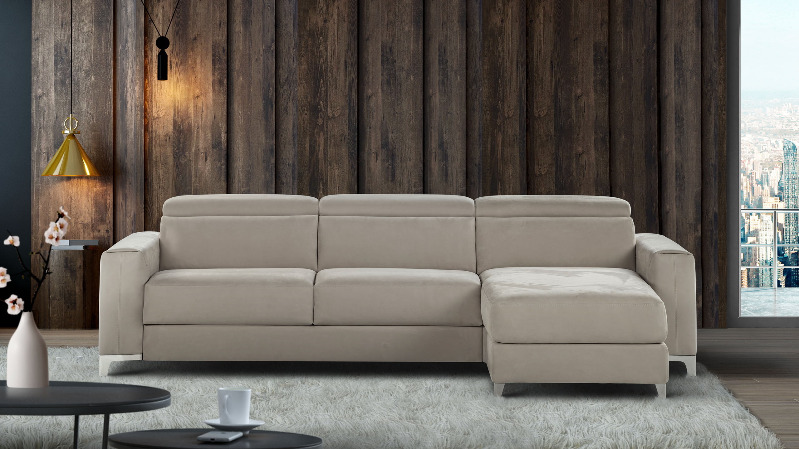 ECLETTICO Modular sofa with customizable armrests, combines a bed, recliner, and chaise-longue for versatile living and relaxation, in a minimalist design that suits any decor.