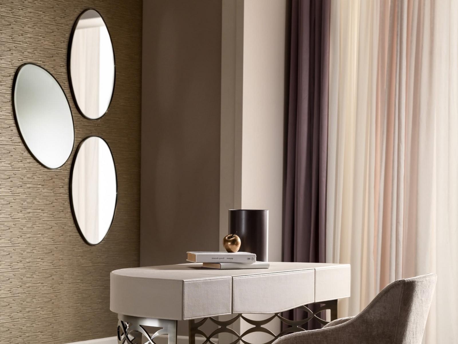 STONE Oval wall-mounted framed iron mirror
